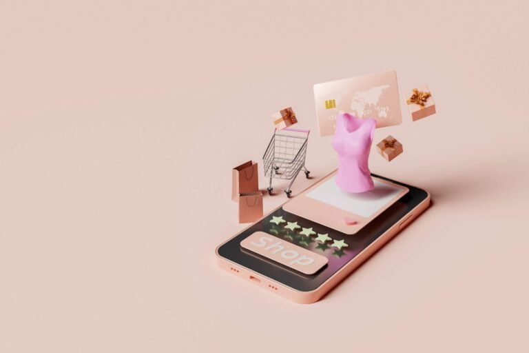 A phone with a shopping cart on it, emphasizing mobile first design.